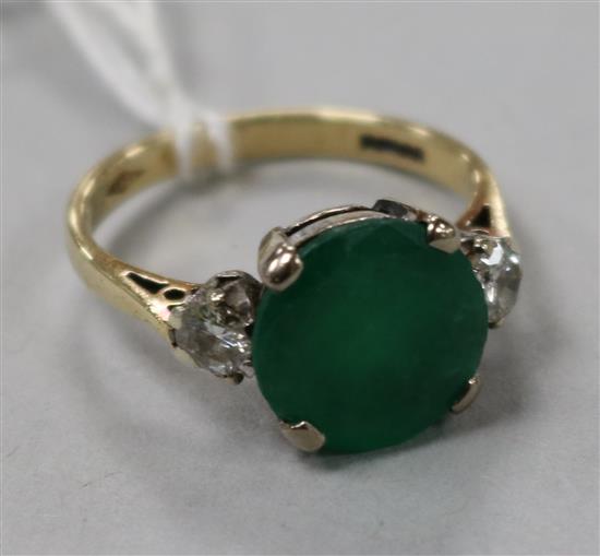 A 9ct gold, emerald and diamond three stone ring, size P.